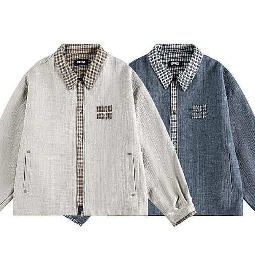 two men's jackets, one in a light gray color and the other in a dark blue color, both with plaid patterns.