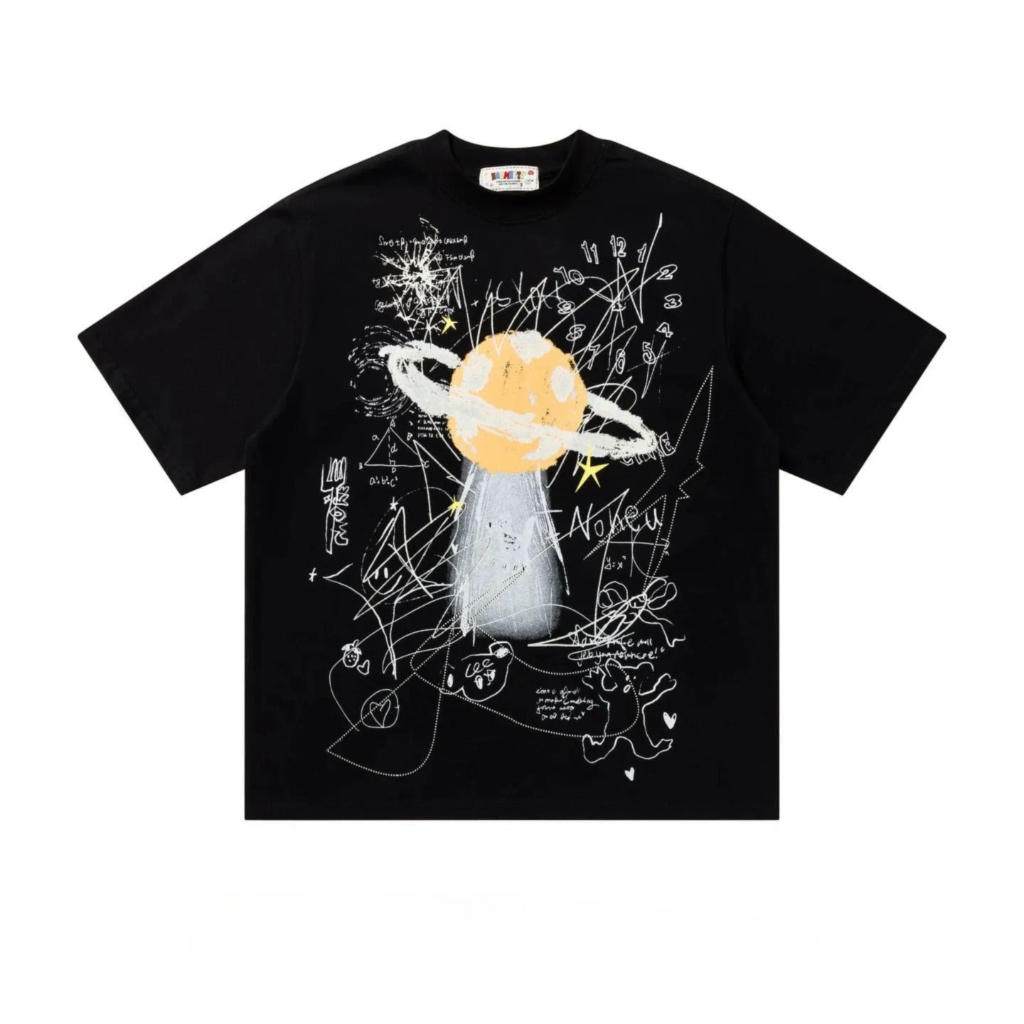 The image is a black t-shirt with a graphic design featuring a yellow planet with a white ring, surrounded by various abstract shapes and lines in white and black.