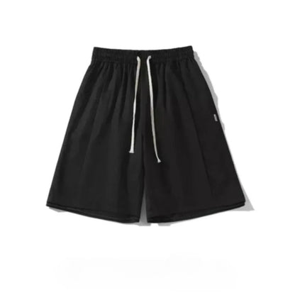 A pair of black shorts with white drawstrings.
