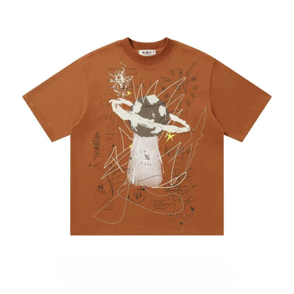 a t-shirt with a graphic design depicting a mushroom-like creature with a ring around it, surrounded by various abstract shapes and lines.