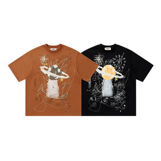 two t-shirts with artistic designs on them.